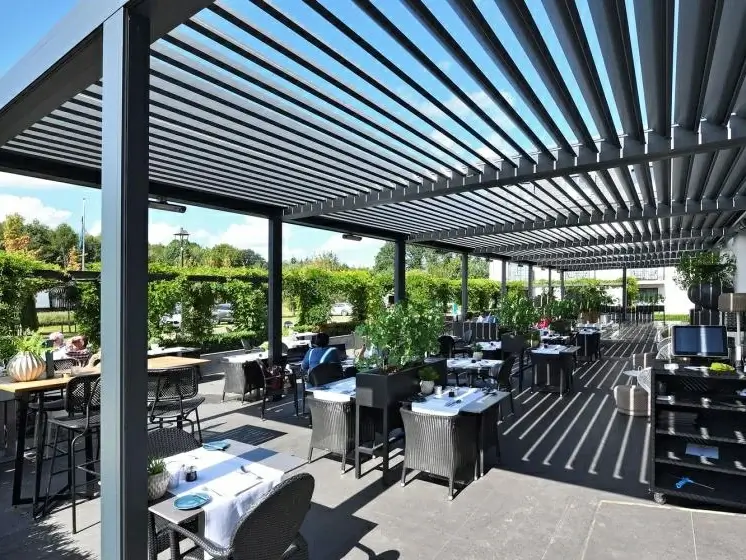 Commercial aluminium louvered pergola project designed for hotels, restaurants, and outdoor hospitality spaces